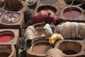 FEZ, MOROCCO Ã¢â¬â FEBRUARY 20, 2017 : Men working at the famous Chouara Tannery in the medina of Fez, Morocco Royalty Free Stock Photo